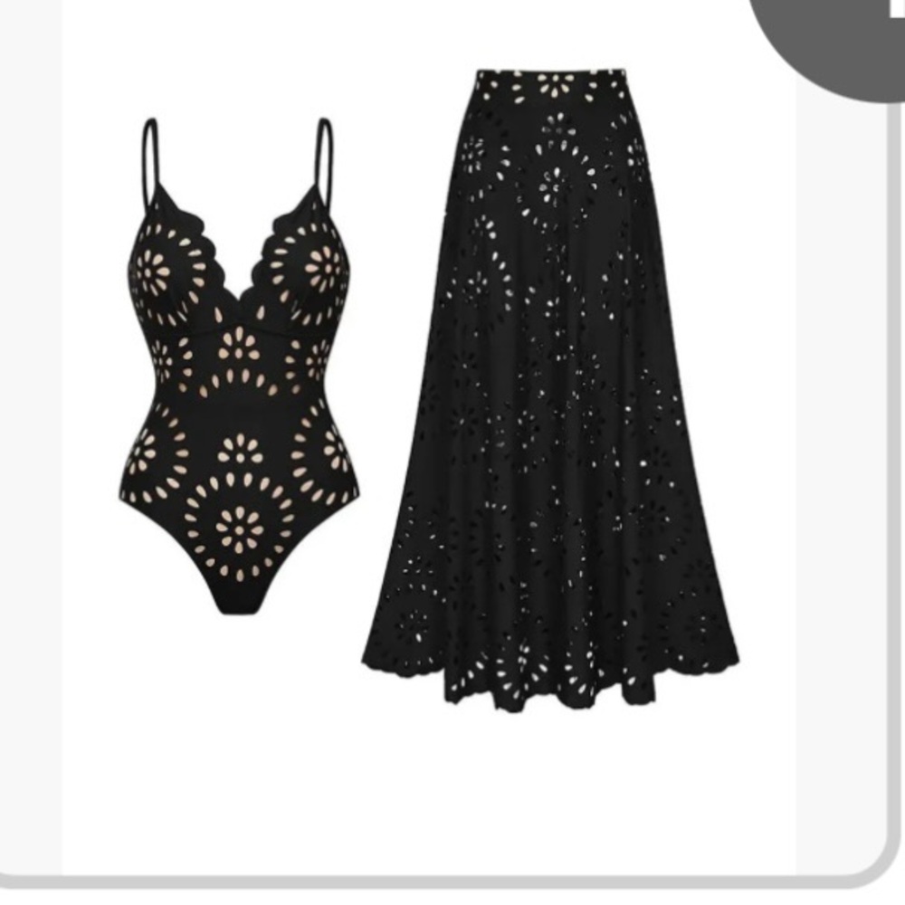 Chic Black Cutout One Piece Swimsuit with pull on skirt